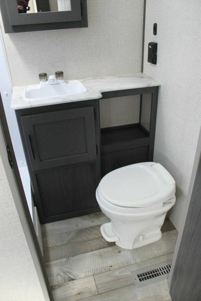 Bathroom with a sink and a toilet.