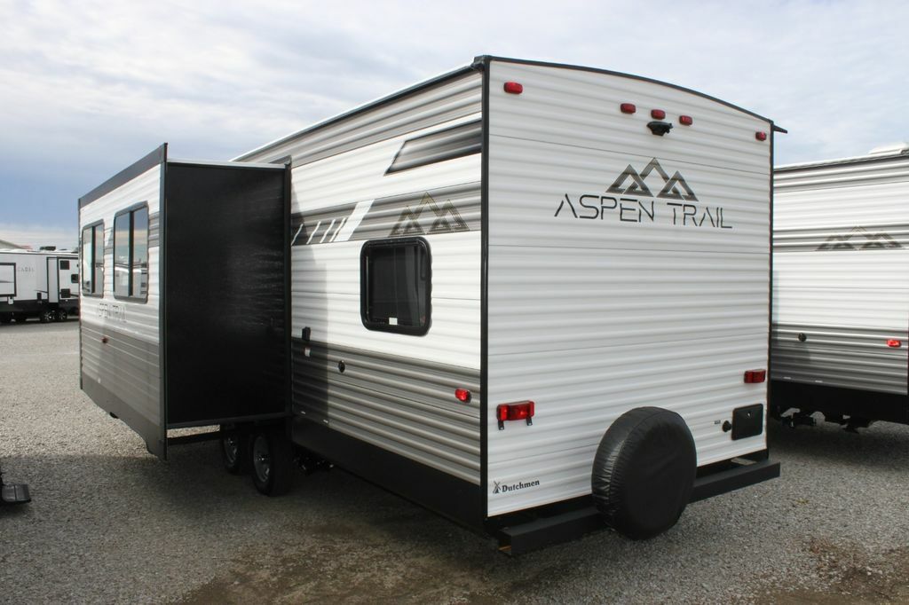 Side view of the RV with a slide out.