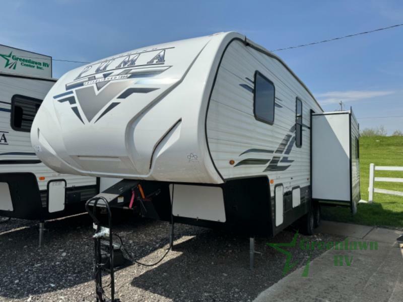 Side view of the RV with a slide out.