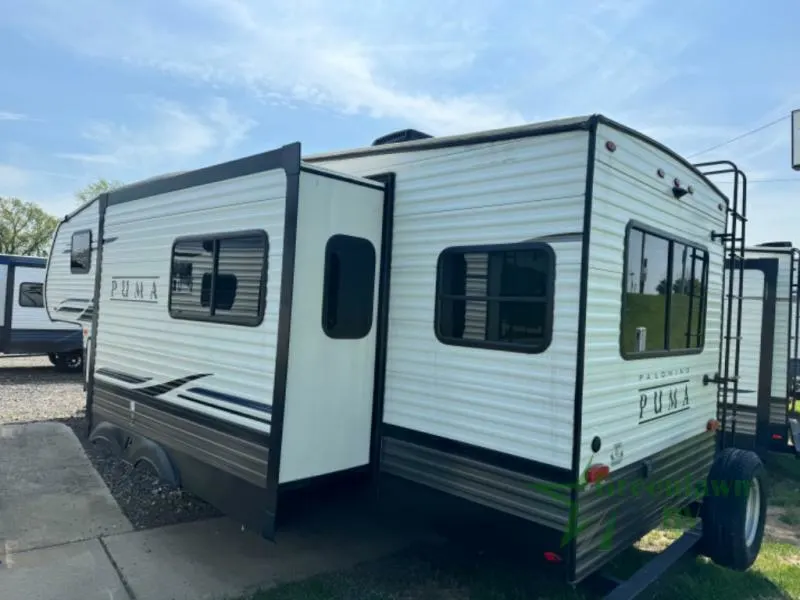 Side view of the RV with a slide out.