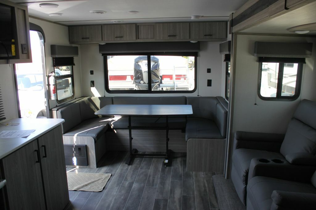 Dinette with overhead cabinets.