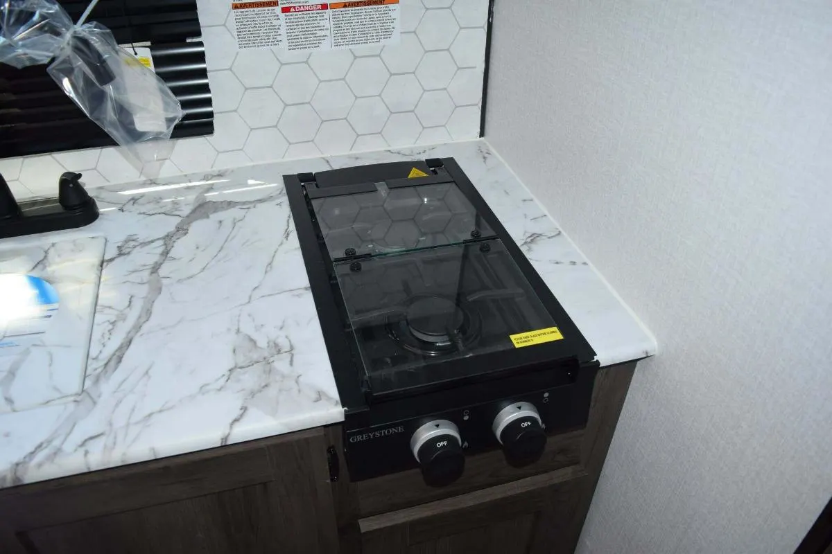 Kitchen with a gas burner.