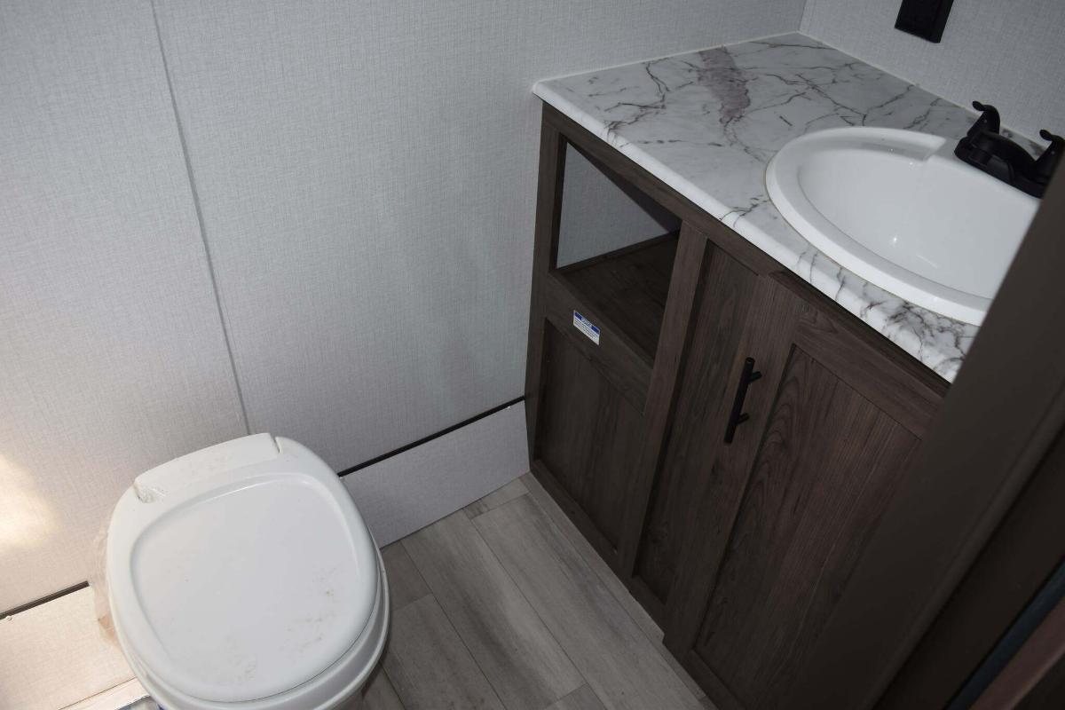 Bathroom with a sink and a toilet.