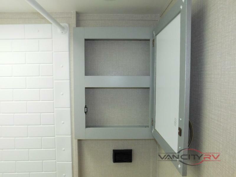 Bathroom with a medicine cabinet.