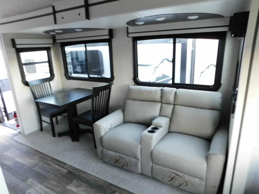 Dinette flanked by reclining chairs