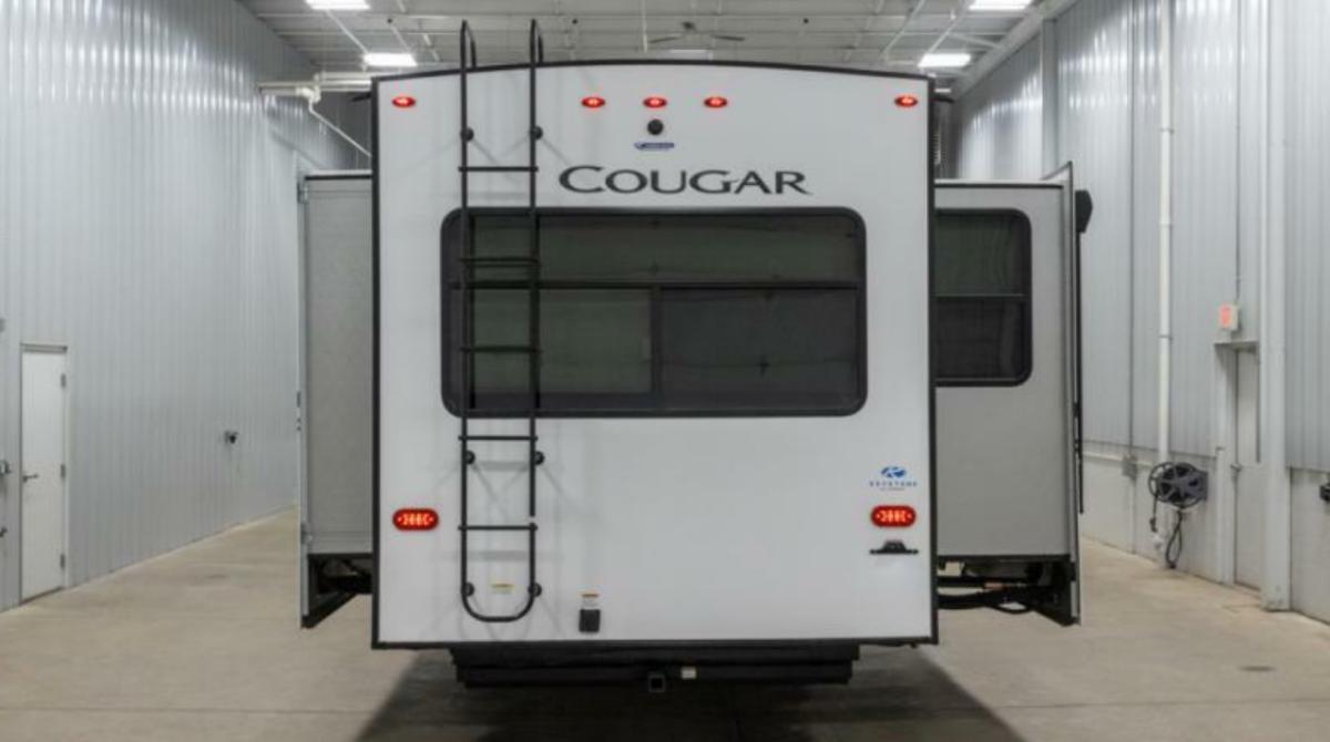 Rear view of the New 2022 Keystone Rv Cougar 355FBS Fifth Wheel RV.