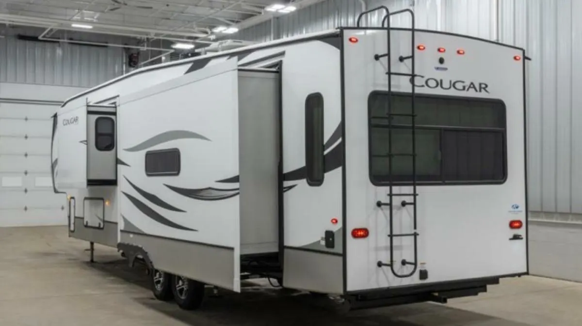 Side view of the New 2022 Keystone Rv Cougar 355FBS Fifth Wheel RV.