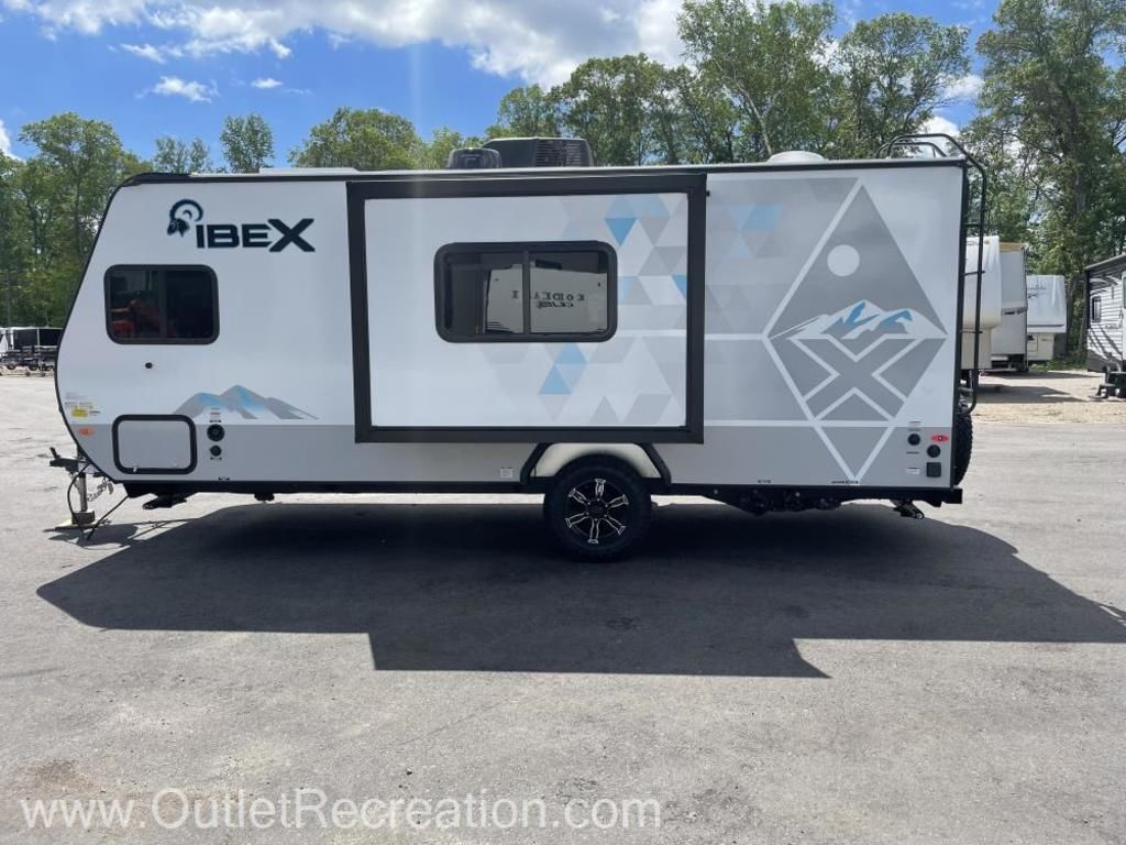 Side view of the New 2022 Forest River IBEX 19QBS Travel Trailer RV.