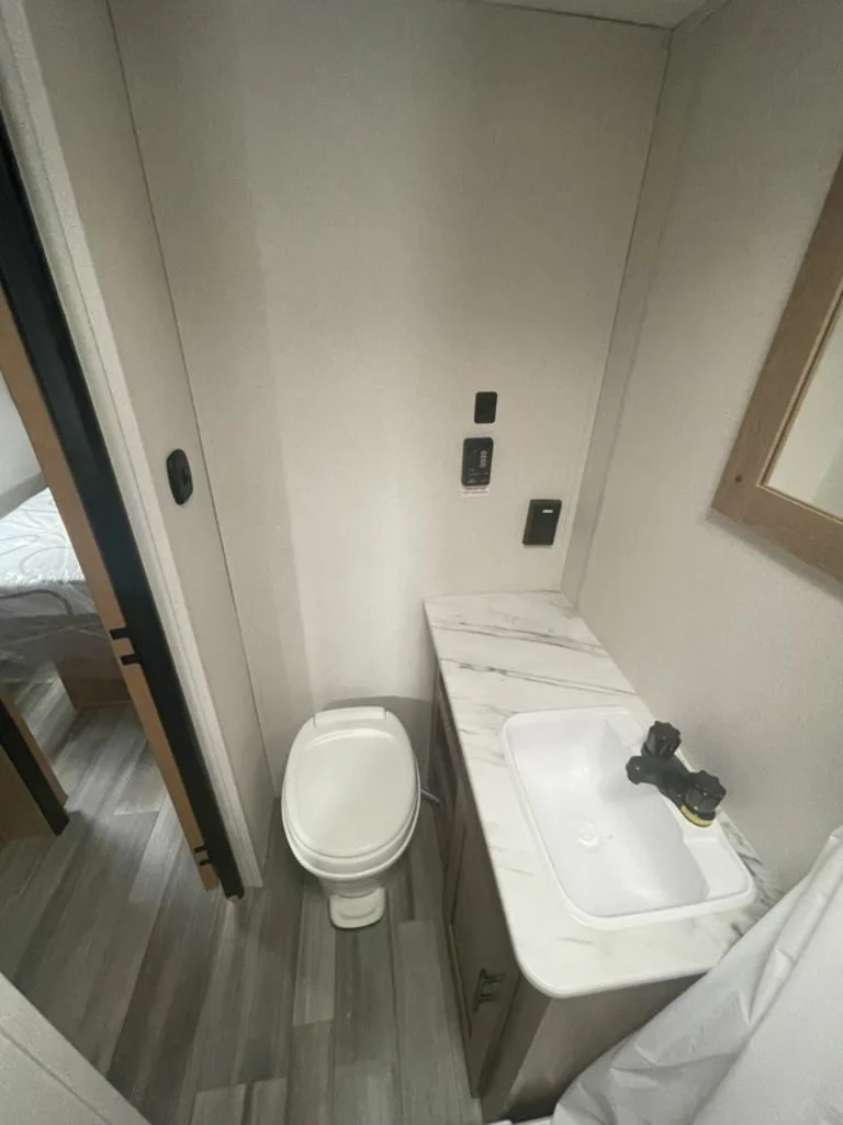 Bathroom with a sink and a toilet.