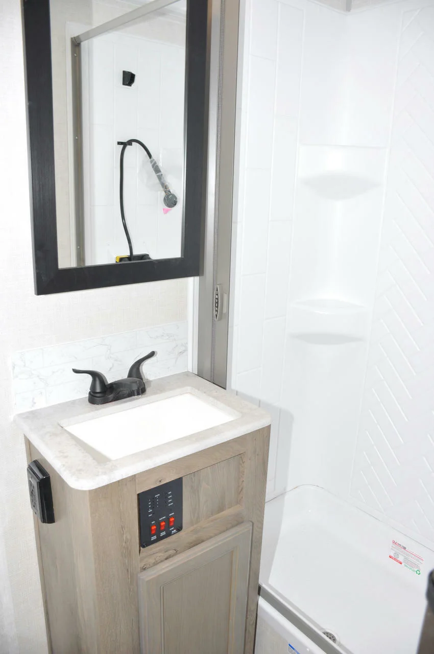 Bathroom with a sink and medicine cabinet.