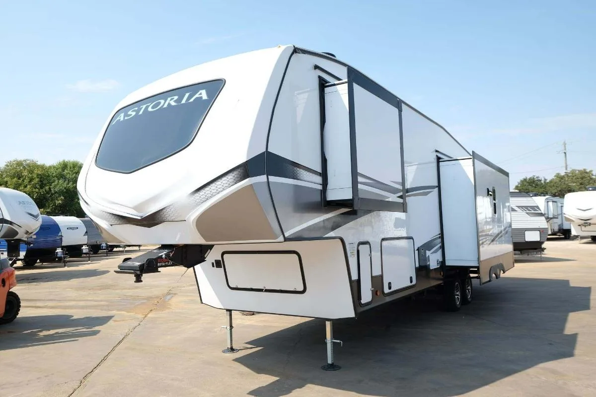 Side view of the New 2022 Dutchmen Astoria 2993RLF Fifth Wheel RV.