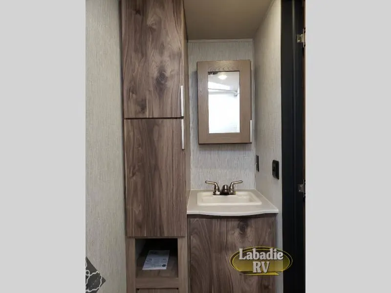 Bathroom with a sink and a medicine cabinet.