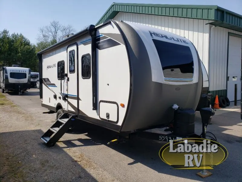 Side view of the New 2022 Palomino Real-Lite Mini RL186 Travel Trailer RV.