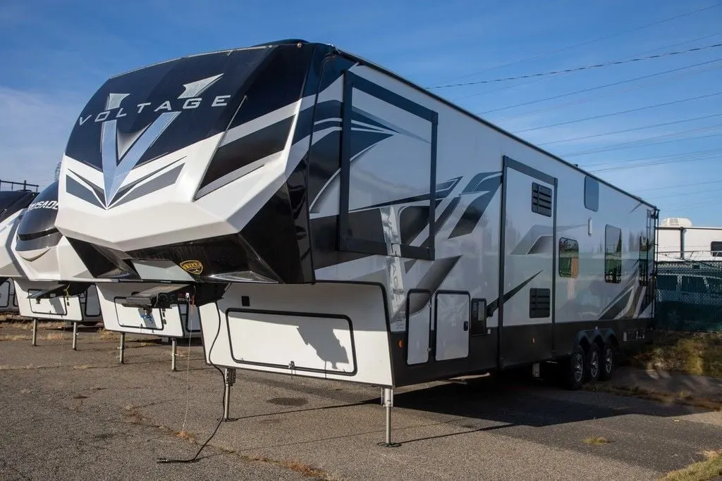 Side view of the New 2022 Dutchmen Voltage 4135 Fifth Wheel RV.