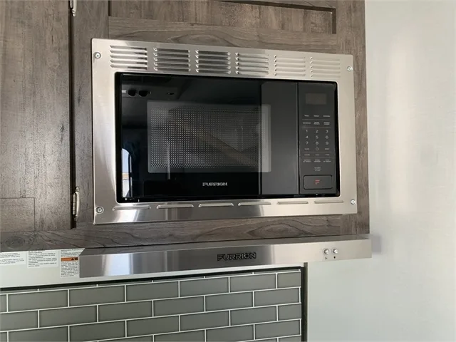 Wall-mounted microwave oven