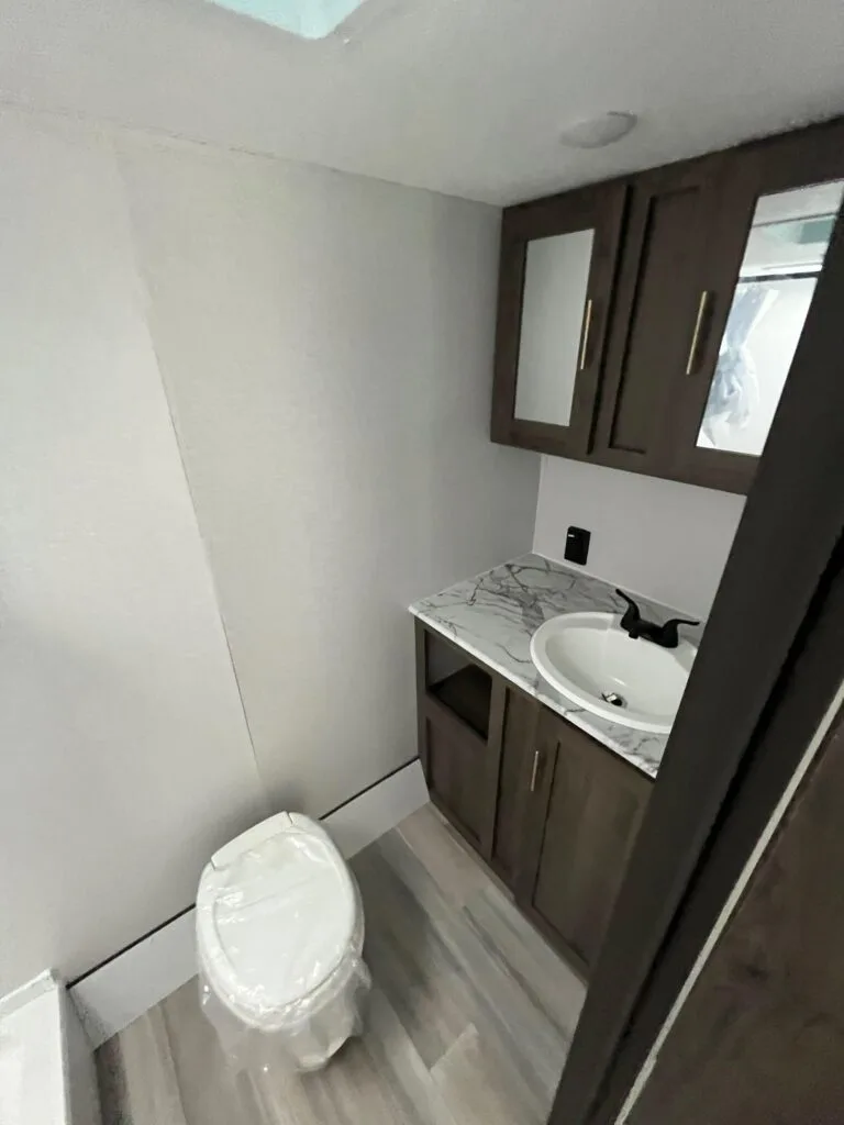 Bathroom with a sink and a toilet.