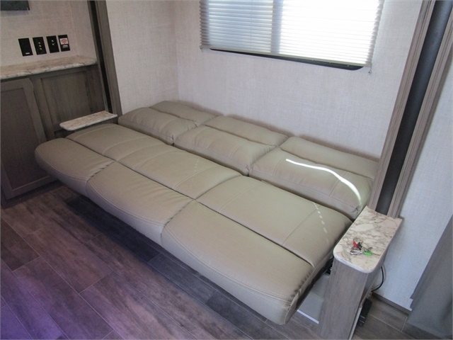 Living space seat converted into a bed. 