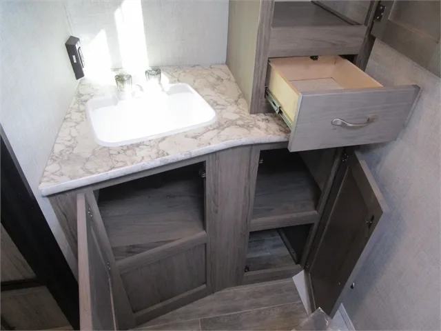 Bathroom with a sink and cabinets.