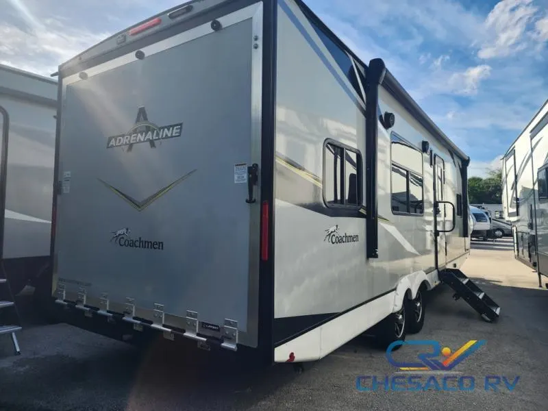 Side view of the New 2022 Coachmen Rv Adrenaline 27LT Travel Trailer Toy Hauler RV.