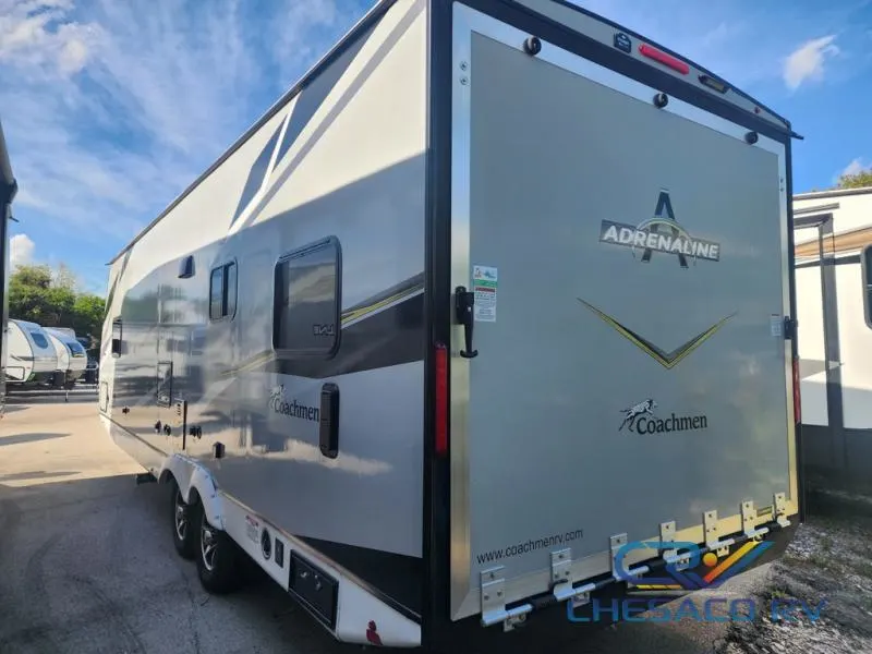 Rear view of the New 2022 Coachmen Rv Adrenaline 27LT Travel Trailer Toy Hauler RV.