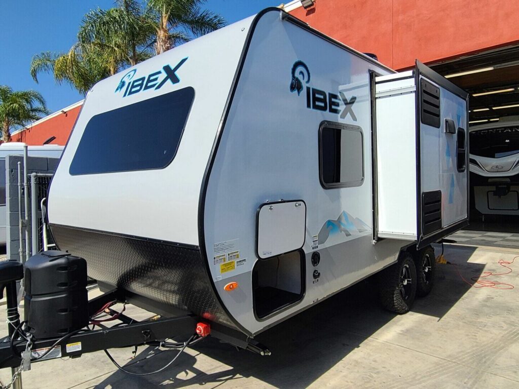 Side view of the RV with a slide out.