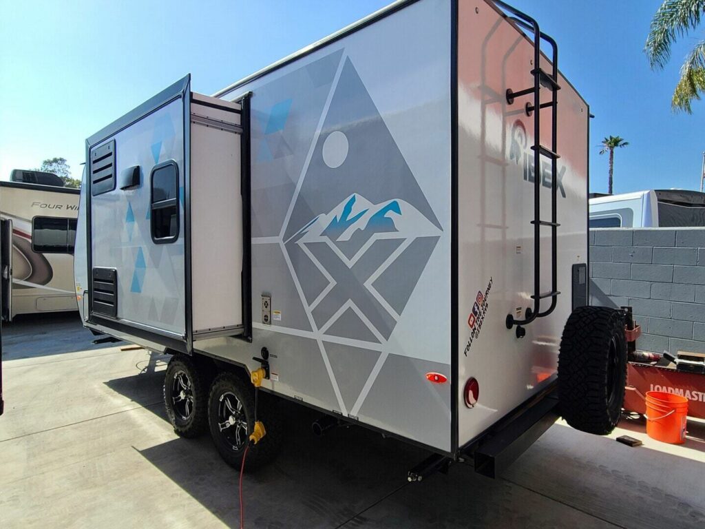 Side view of the RV with a slide out.