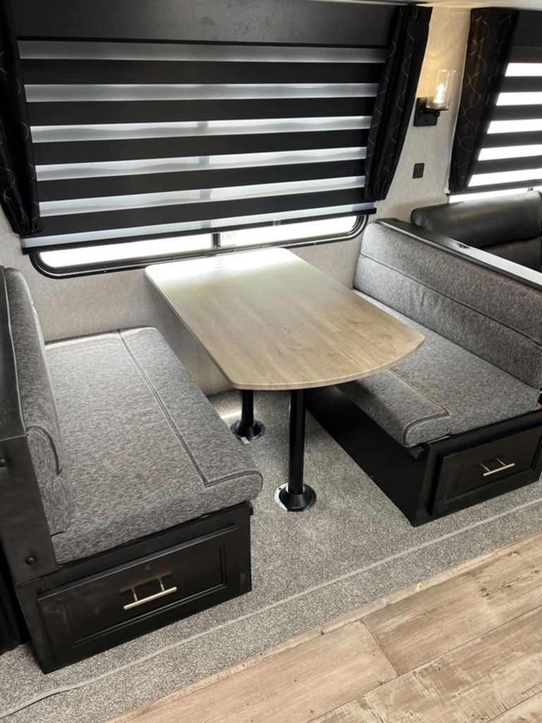 Dinette with pull-out storage drawers.