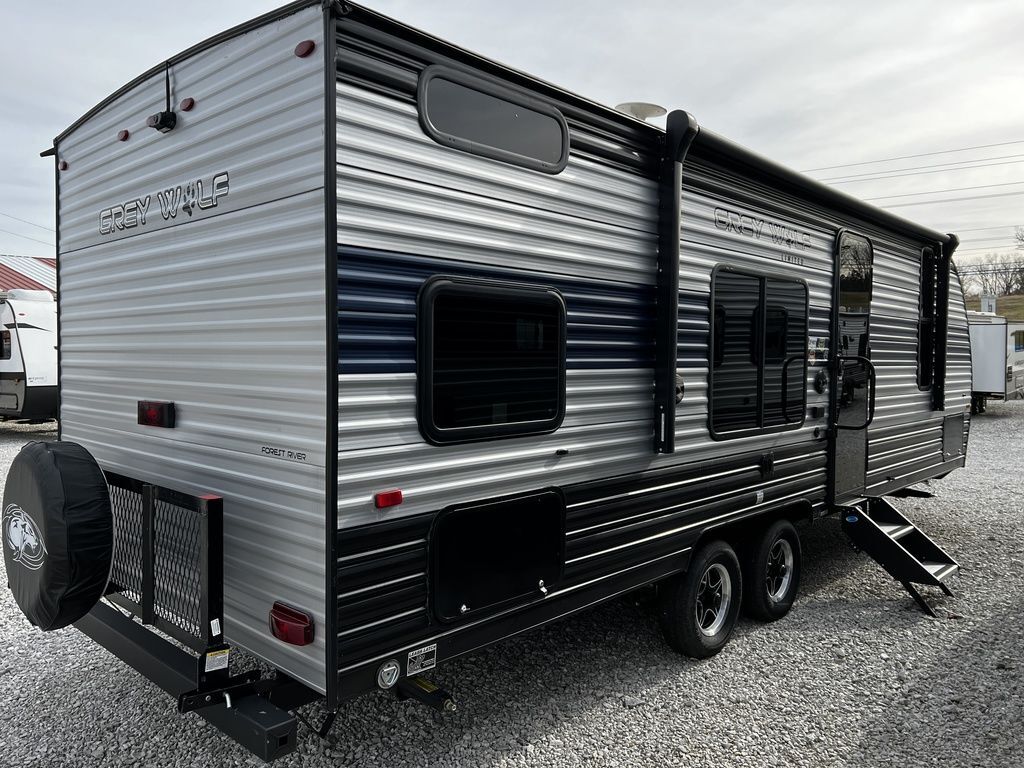 Side view of the New 2022 Forest River Cherokee Grey Wolf 26DJSE Travel Trailer RV.