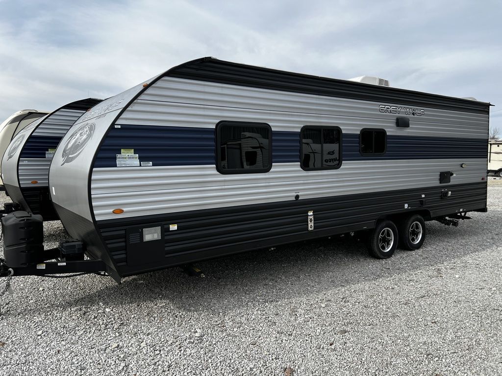 Side view of the New 2022 Forest River Cherokee Grey Wolf 26DJSE Travel Trailer RV.