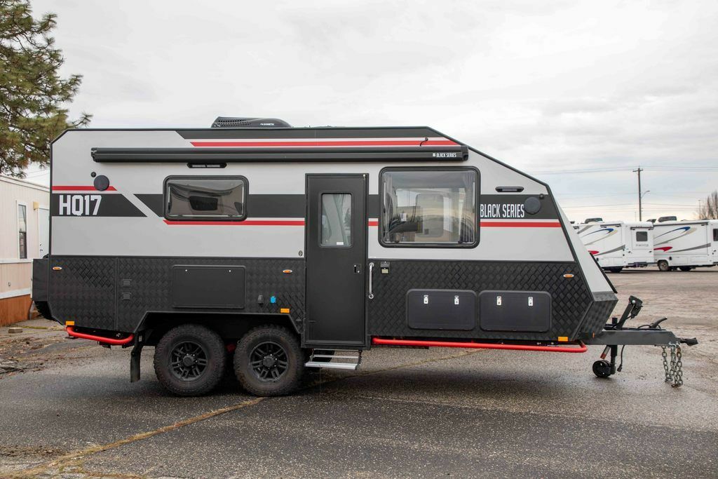 Side view of the New 2022 Black Series Camper Travel Trailers HQ 17 Travel Trailer RV.