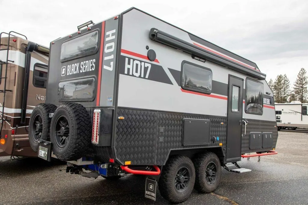 Side view of the New 2022 Black Series Camper Travel Trailers HQ 17 Travel Trailer RV.