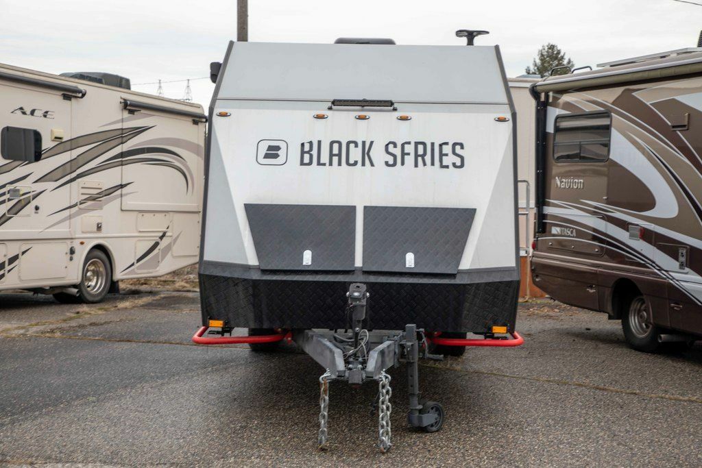 Front view of the New 2022 Black Series Camper Travel Trailers HQ 17 Travel Trailer RV.