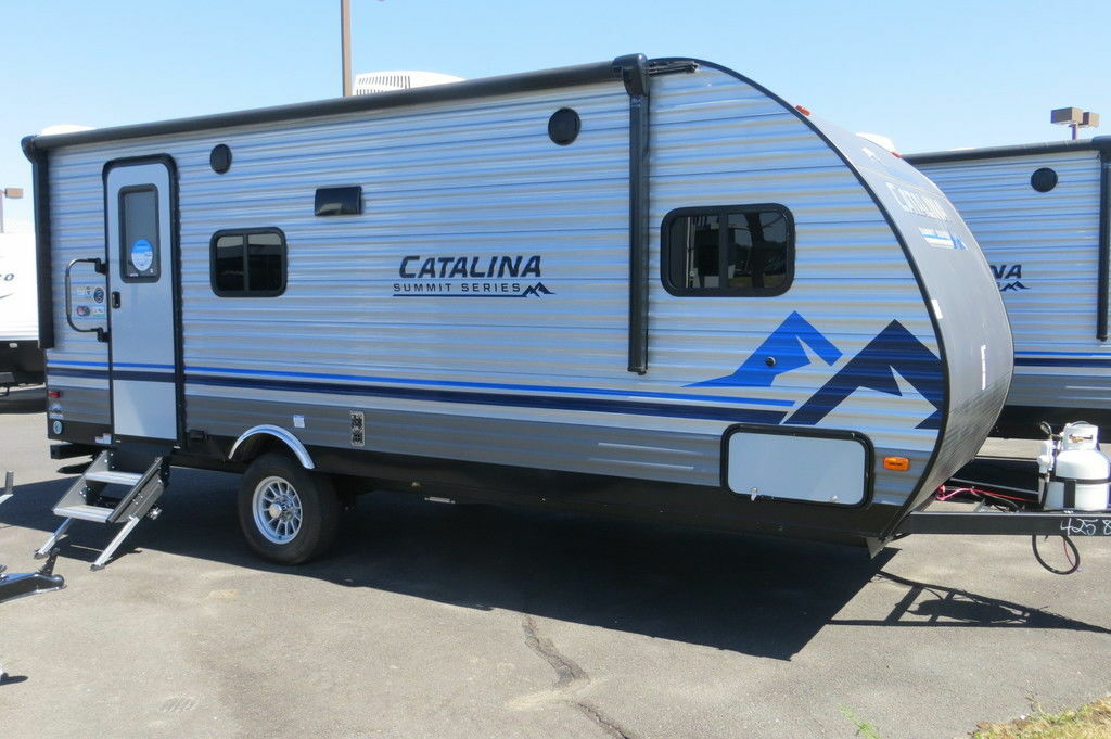 Side view of the New 2022 Coachmen Catalina Summit Series 7' 184FQ Travel Trailer RV.