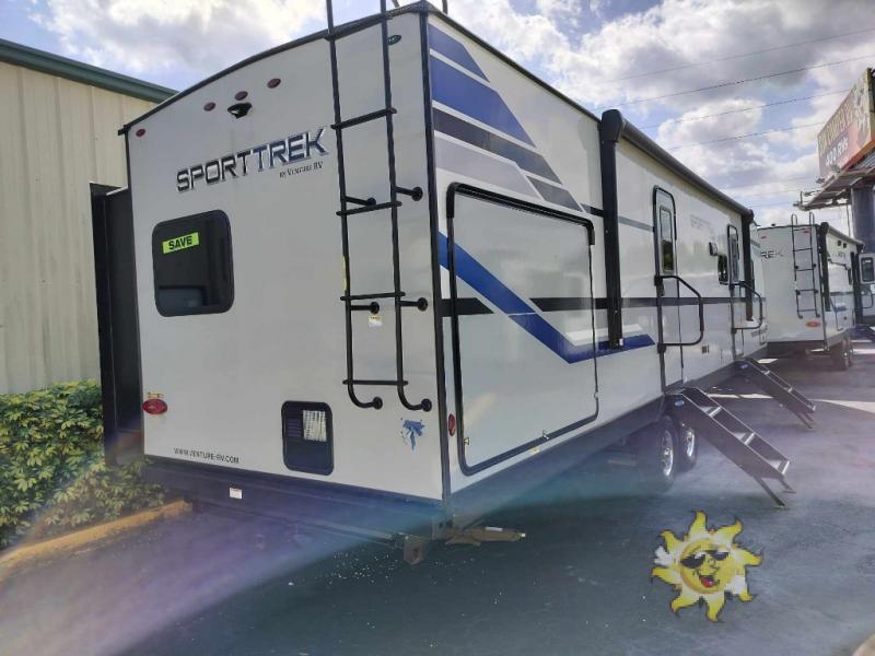 Side view of the New 2022 Venture RV SportTrek ST332VBH Travel Trailer RV.