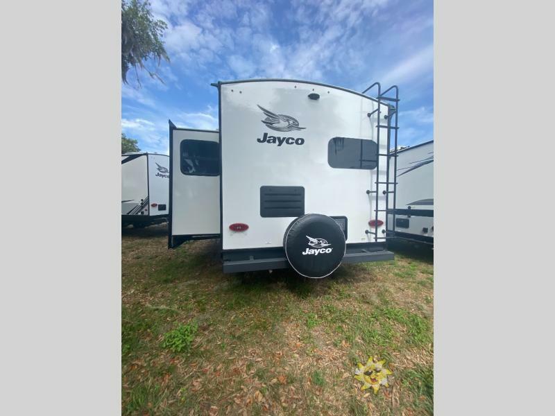 Rear view of the New 2022 Jayco White Hawk 27RK Travel Trailer RV.