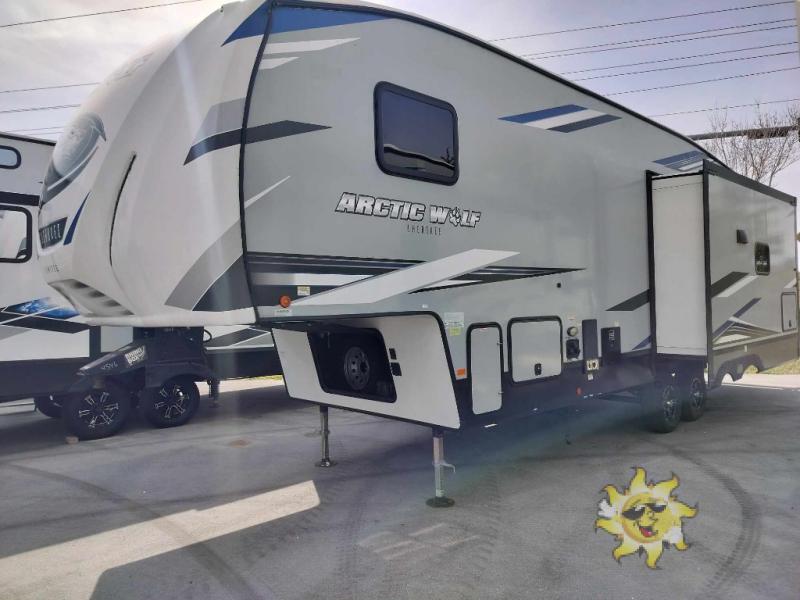 Side view of the New 2022 Forest River Rv Cherokee Arctic Wolf 291RL Fifth Wheel RV.