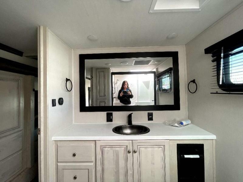 Bathroom with a custom-made vanity.