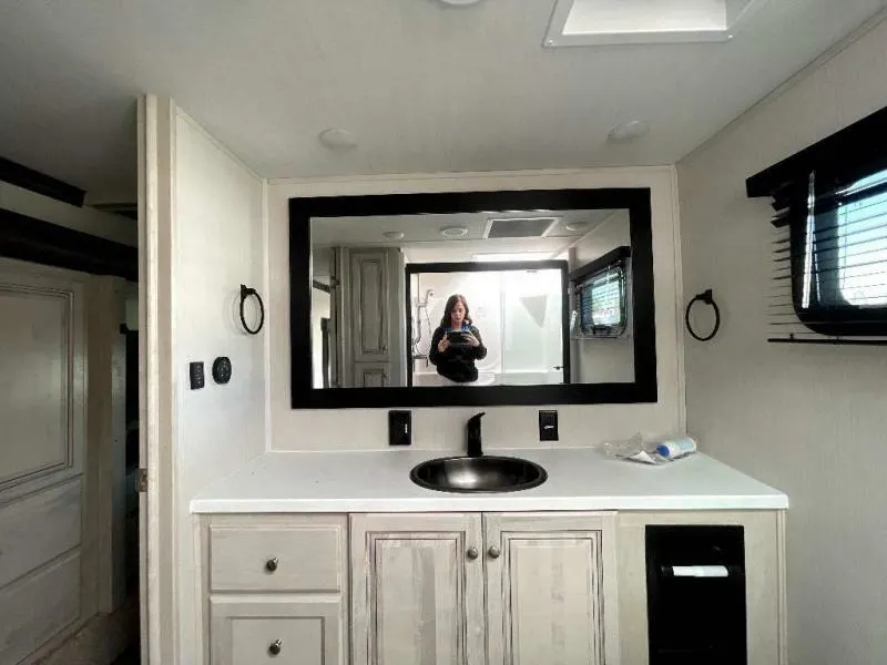 Bathroom with a custom-made vanity.