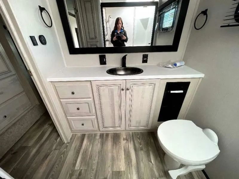 Bathroom with a sink and a toilet.