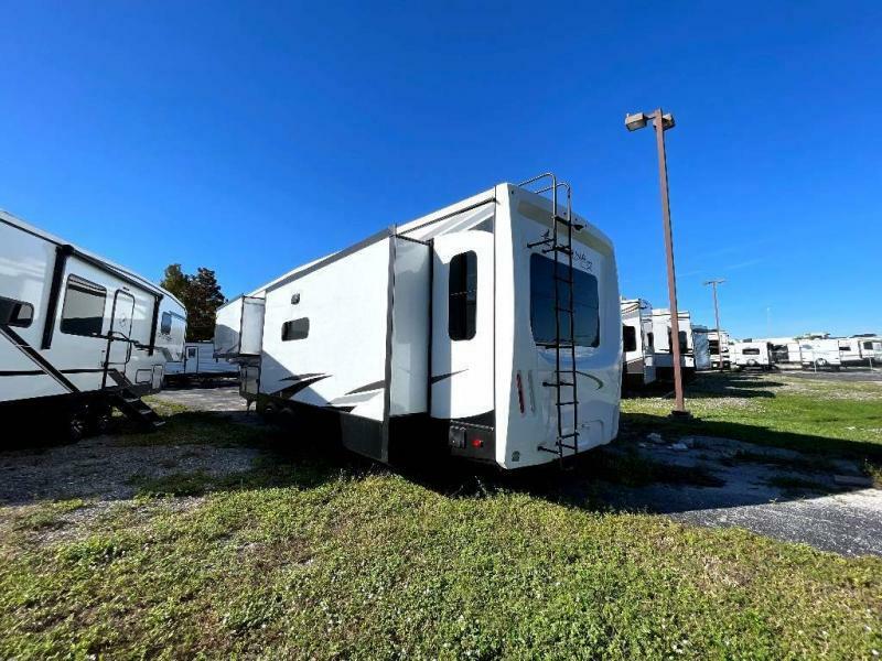 Side view of the RV with slide out.