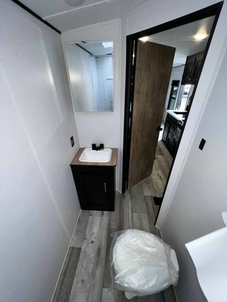 Bathroom with a sink and a toilet