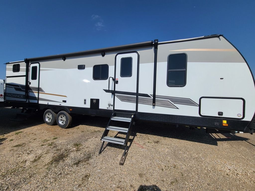 Side view of the New 2022 Cruiser Rv Radiance R-30DS Travel Trailer RV.