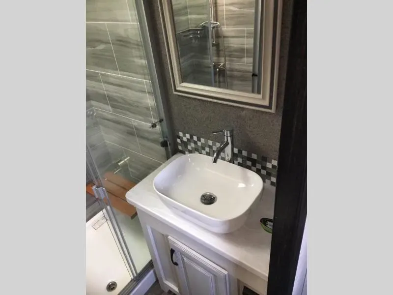 Bathroom with a sink and a medicine cabinet.