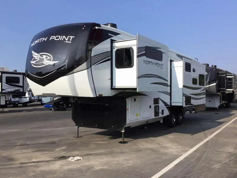 Side view of the New 2022 Jayco NorthPoint 310RLTS Fifth Wheel RV.