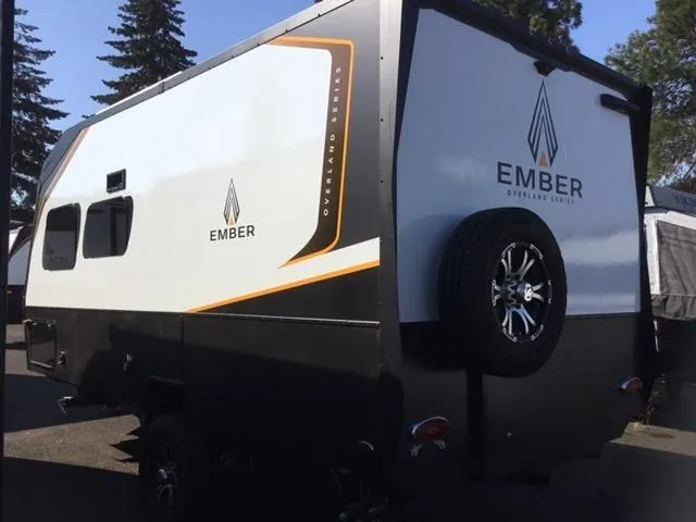 Side view of the New 2022 Ember OVERLAND 170MRB Travel Trailer RV.