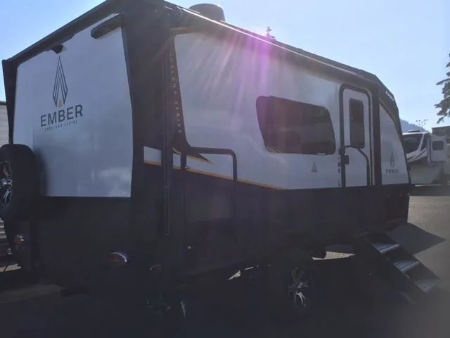 Side view of the New 2022 Ember OVERLAND 170MRB Travel Trailer RV.