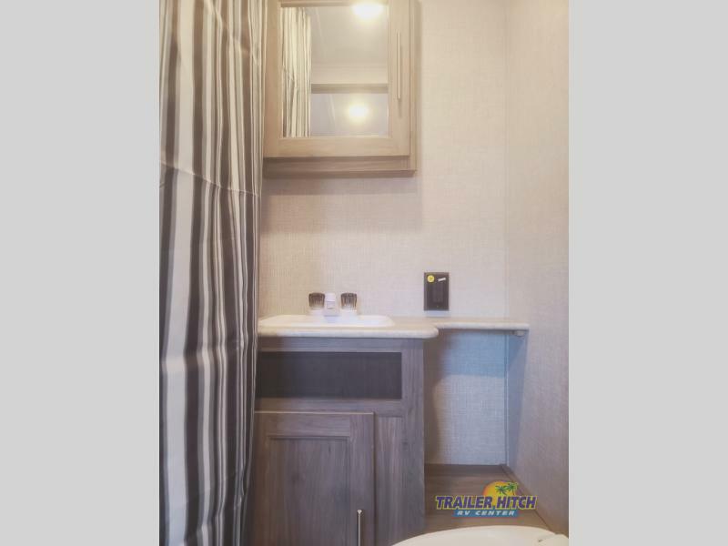 Bathroom with a sink and a medicine cabinet.