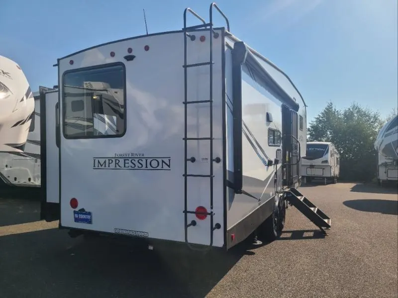 Rear view of the New 2022 Forest River IMPRESSION 240RE Fifth Wheel RV.