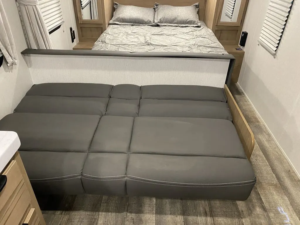 Living space seat converted into a bed. 