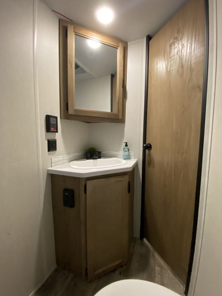 Bathroom with a sink and a medicine cabinet.